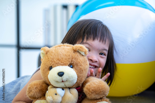 a child with autism spectrum disorder playing in therapy session living room new normal