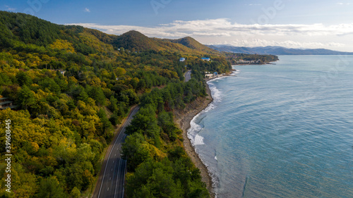 Seaside resort, mountain road along the sea, aerial view