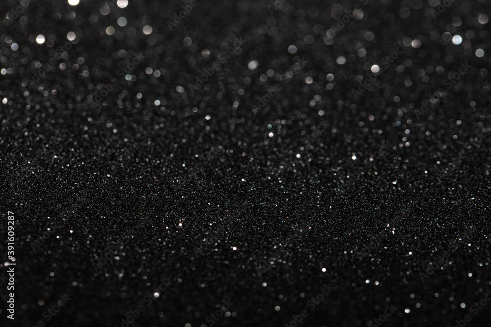 Black glitter textured patterned background Black glitter textured patterned background
