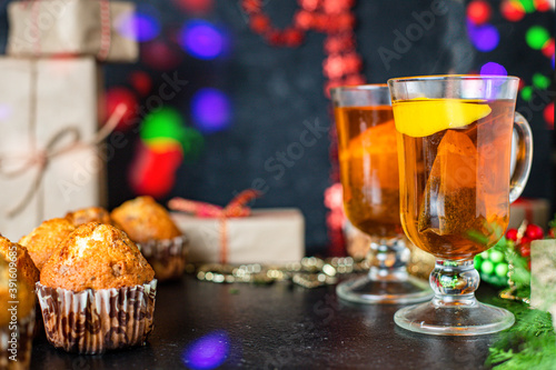 muffin sweet dessert christmas cupcakes and cup of tea festive table setting holidays new year gift tasty top view copy space food background rustic