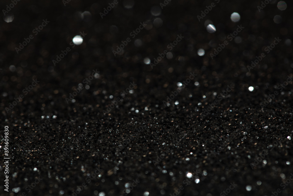 Black glitter textured patterned background Black glitter textured patterned background