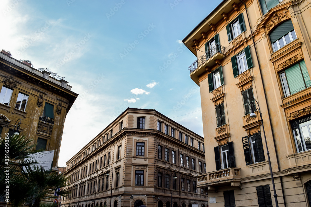 Beautiful buildings in Rome in contrast with the blue sky.
