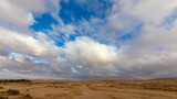 Wide panorama of the clouds over Negev desert at morning