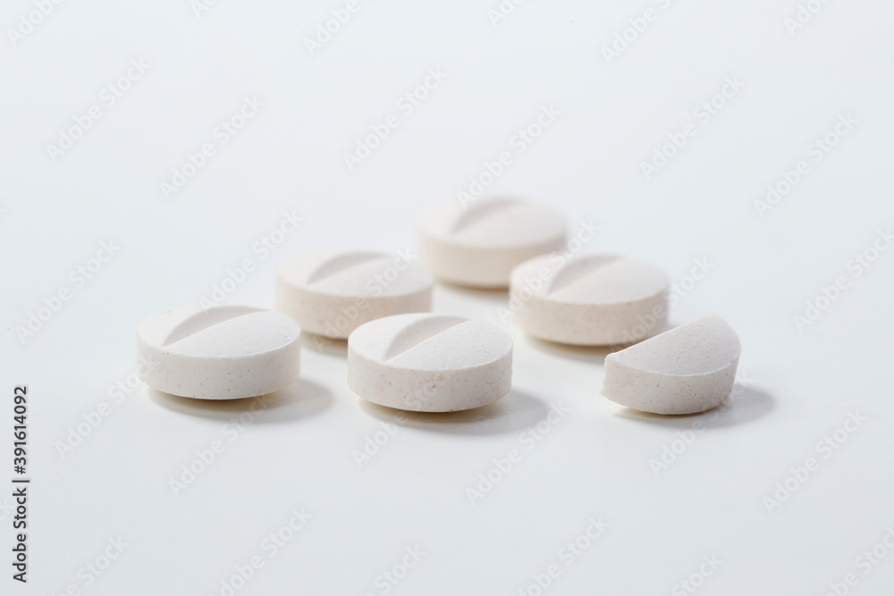 Five and a half tablets on a white background