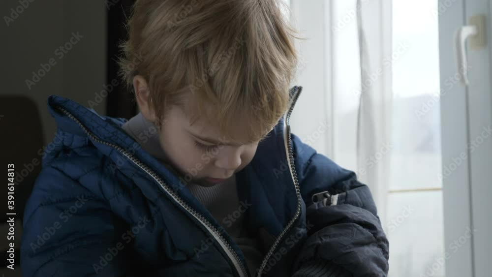 Cute Child Fastens Jacket with a Zipper. Little Boy Wearing Winter Attire Zipping with Zip-fastener. 2x Slow motion 60 fps 4K Cute Child Fastens Jacket with a Zipper. Little Boy Wearing Winter Attire Zipping with Zip-fastener. 2x Slow motion 60 fps 4K