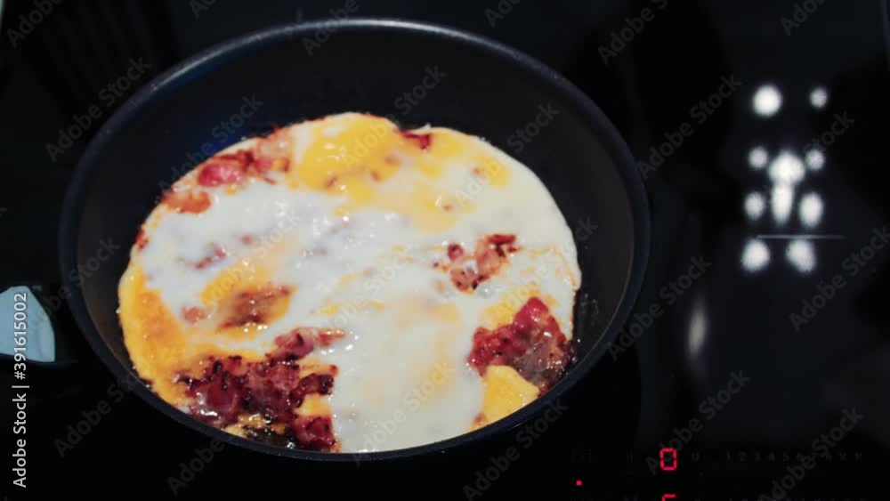 Frying of delicious an bacon and egg. Frying of delicious an bacon and egg.