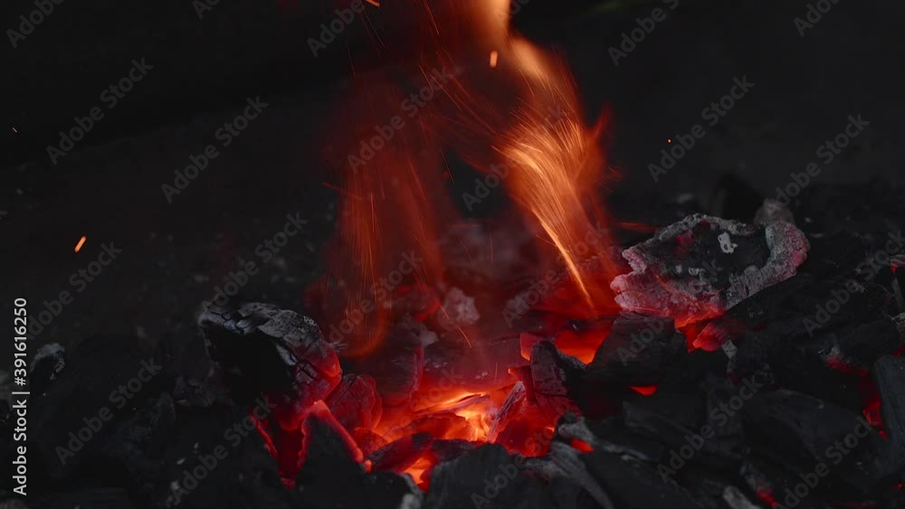 Close-up of embers on a barbecue grill in the garden Close-up of embers on a barbecue grill in the garden
