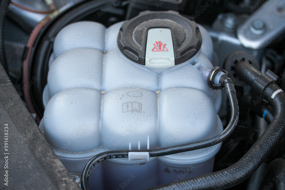 Coolant expansion tank in new vehicle Coolant expansion tank in new vehicle