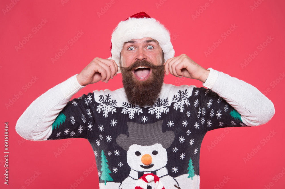 Real feelings. merry christmas. happy bearded man in santa hat and sweater. brutal hipster celebrate xmas party. winter holiday preparations. male winter knitwear fashion. happy new year