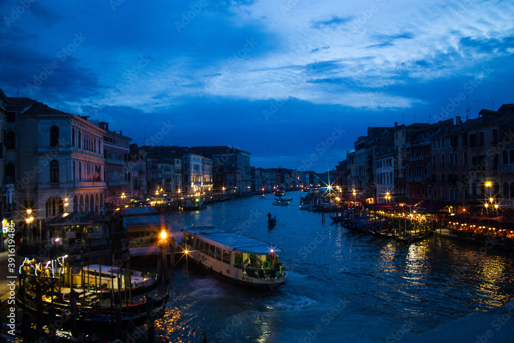 View of a canal in Venice at night