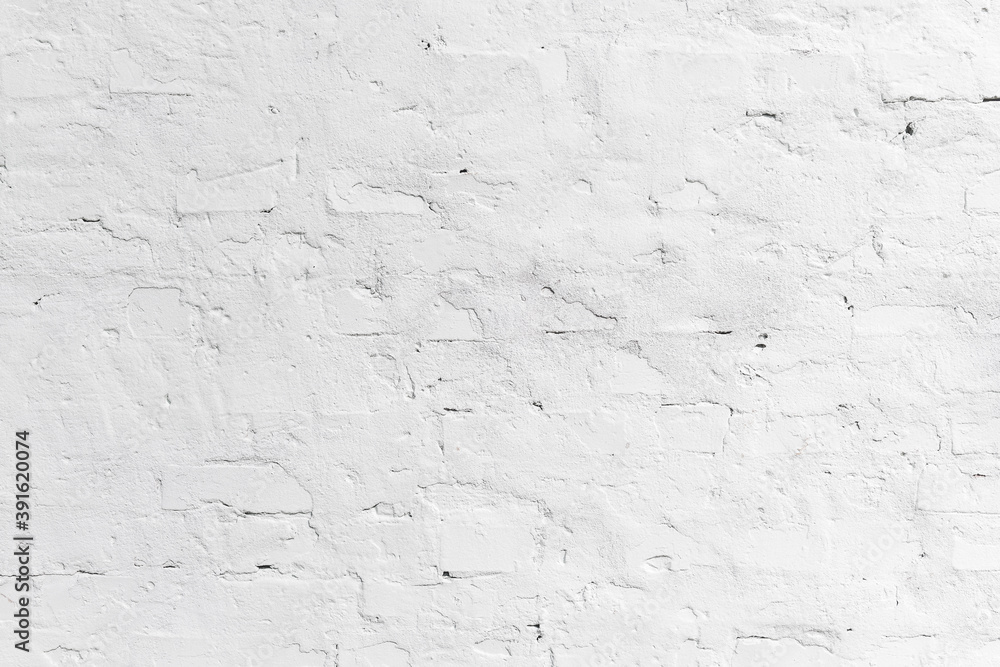 Fototapeta premium Texture of white wall of bricks and cement mortar