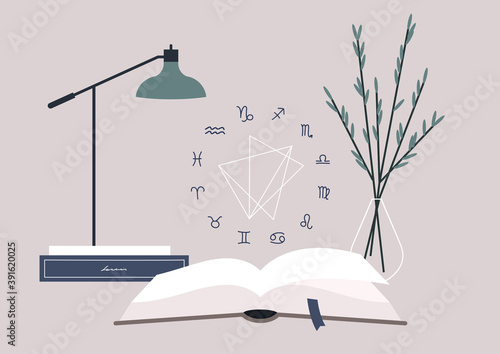 A modern astrology concept, a natal chart scheme with zodiac signs  hovering over the open book
