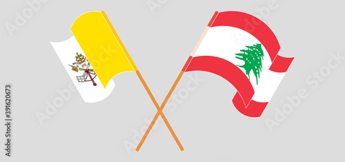 Crossed and waving flags of Vatican and Lebanon