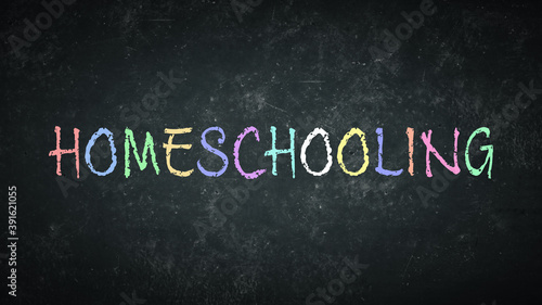 Term homeschooling on a rustic blackboard. photo