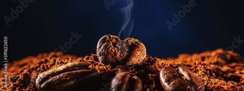 Bilde på lerret Coffee bean in the form of heart with aromatic smoke from copies of space