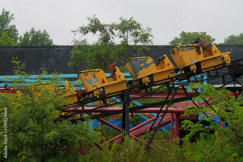 Abandoned roller coaster carts from a theme park