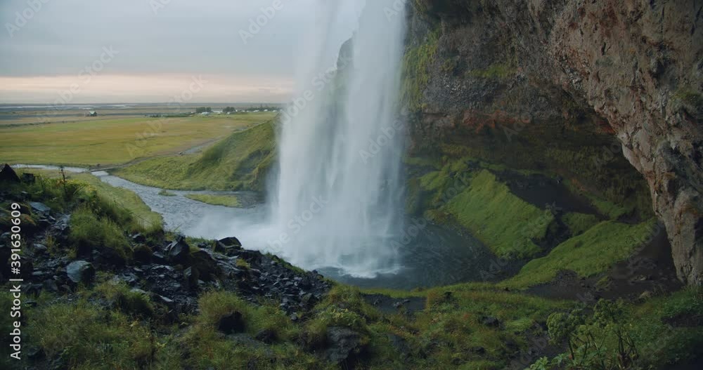 Close up of beautiful Seljalandfoss waterfall lit by sunset, Iceland Close up of beautiful Seljalandfoss waterfall lit by sunset, Iceland
