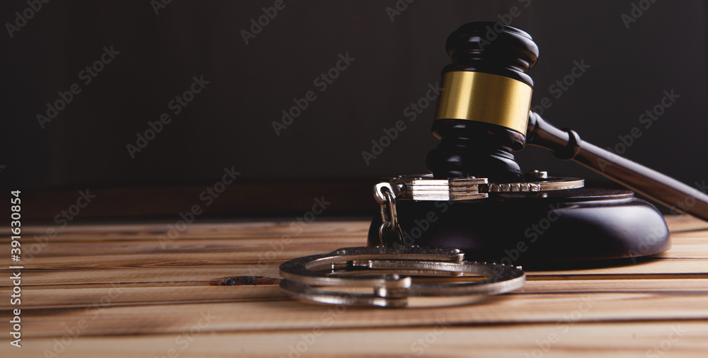 Legal law concept image - gavel and handcuffs Legal law concept image - gavel and handcuffs