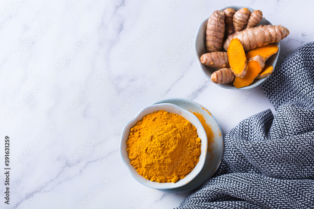 Fototapeta premium Turmeric root curcuma longa powder, superfood, spices