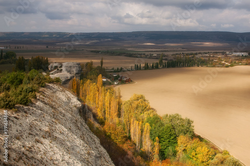 Beautiful autumn landscape with mountains and forest. Bright colors of autumn. Crimea, Arman-Kaya mountain, Tankovoe village