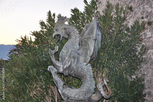 Rijeka  Croatia November 2020. Head of the obelisk statue inside Trsat castle overlooking Rijeka in Croatia. Basilisk statue in Rijeka castle. Bronze sculpture of a mythical Basilisk monster.