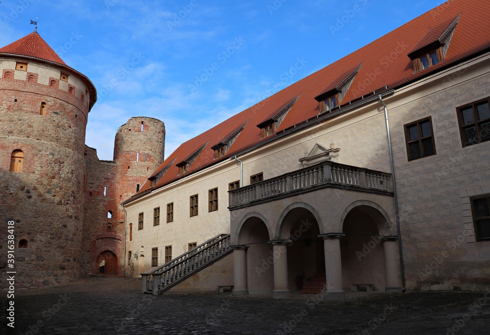 The courtyard of the old Bauska castle in Latvia on a sunny autumn day 2020