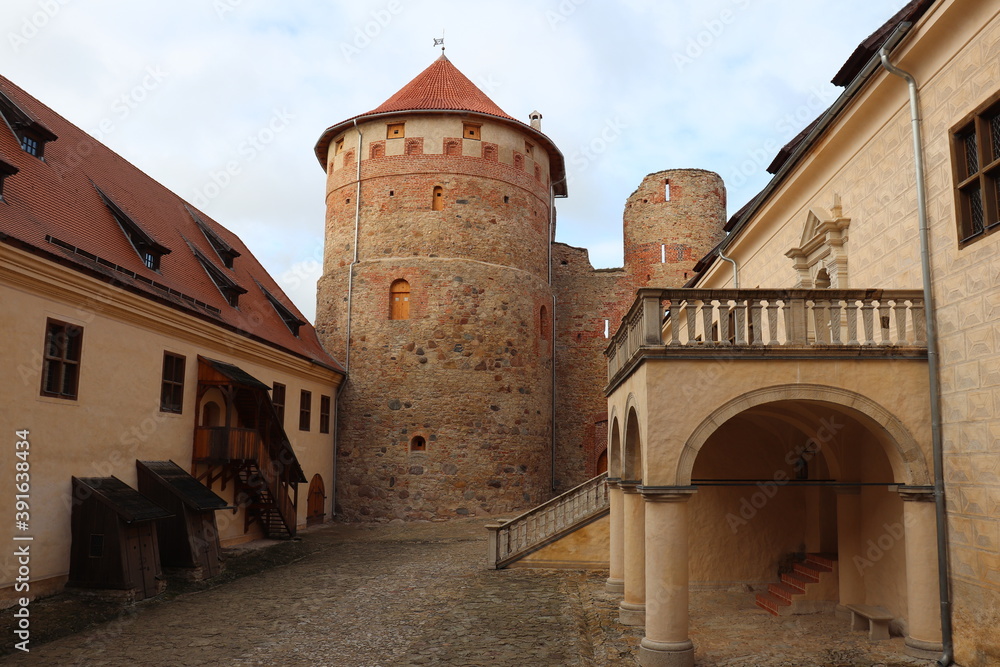 The courtyard of the old Bauska castle in Latvia on a sunny autumn day 2020