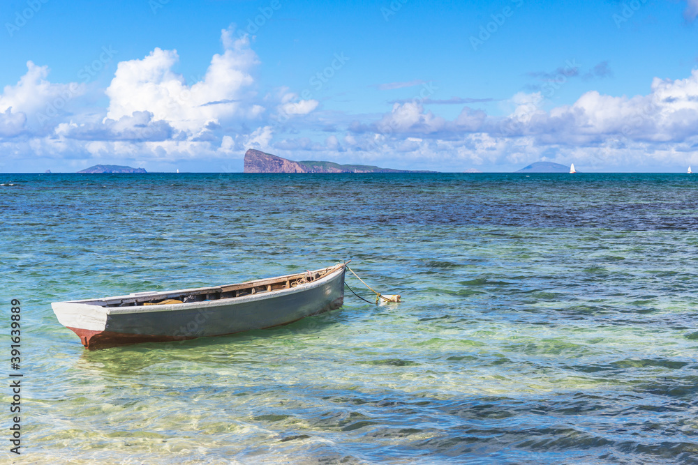 Cap Malheureux,view with turquoise sea and traditional boat,Mauritius island
