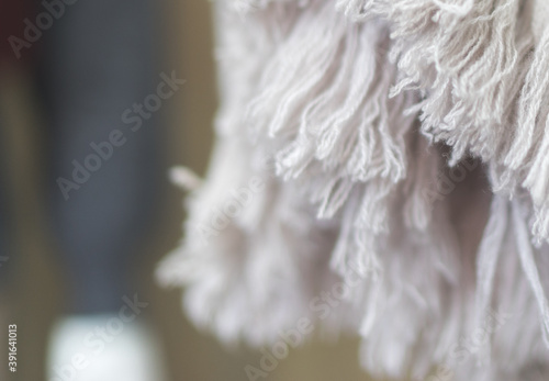 close up of a white pink fabric, wool and cashmere, soft natural textile, winter concept photo