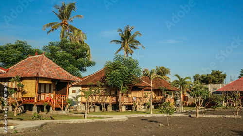 Traditional balinese wooden bungalows photo