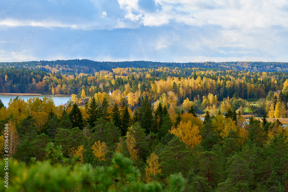 Turku archipelago on autumn time. Baltic sea coast with white clouds on sky.