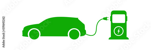 Electric car charging .Green electric car with charging station   on white background . Vector icon . Eco fuel .Hybrid auto .