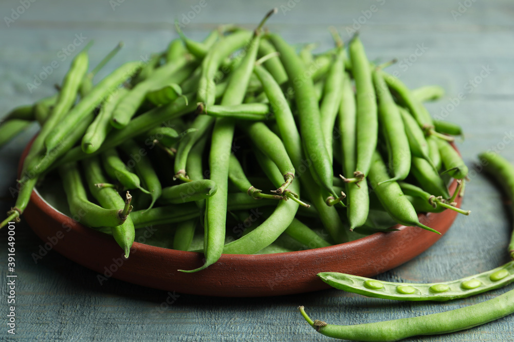 Fresh green beans on blue wooden table, closeup Fresh green beans on blue wooden table, closeup
