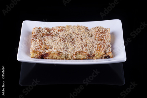 Crumble guava cake on a black background