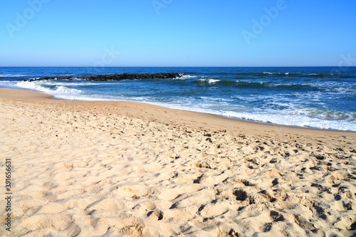View of the beach in Belmar  New Jersey  along the long Jersey Shore beach on the Atlantic Ocean