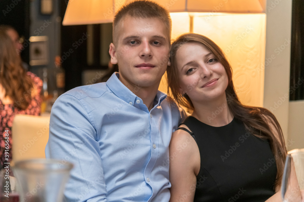 Beautiful couple in a restaurant, London, UK Beautiful couple in a restaurant, London, UK