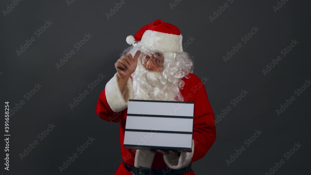 Papa noel con anuncio luminoso marquesina feliz alegre