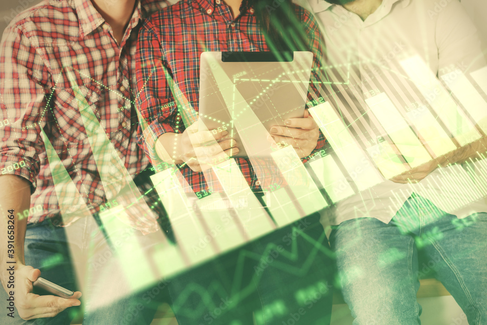 Double exposure of forex graph drawing and man and woman working together holding and using a mobile device. Trade concept. Double exposure of forex graph drawing and man and woman working together holding and using a mobile device. Trade concept.