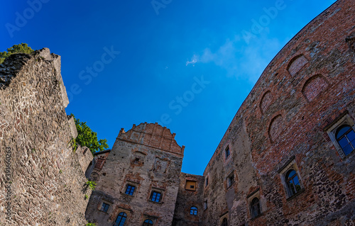 Courtyard of Grodno Castle in Zagorze under the sunlight and a blue sky in Poland photo