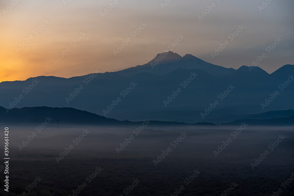 Sunrise with the mist over the river and the plain in Kayseri, in front of Erciyes mountain Sunrise with the mist over the river and the plain in Kayseri, in front of Erciyes mountain