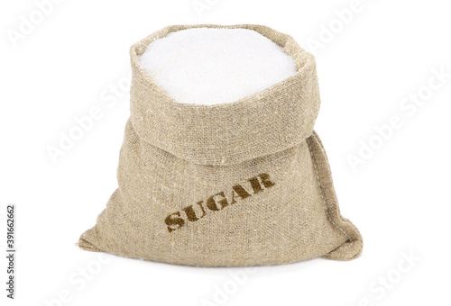 Sugar in a sack isolated on a white background. White Sugar in burlap sack. Sugar in jute bag