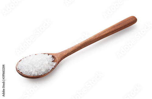Plakat Himalayan rock salt in a spoon placed on a white background