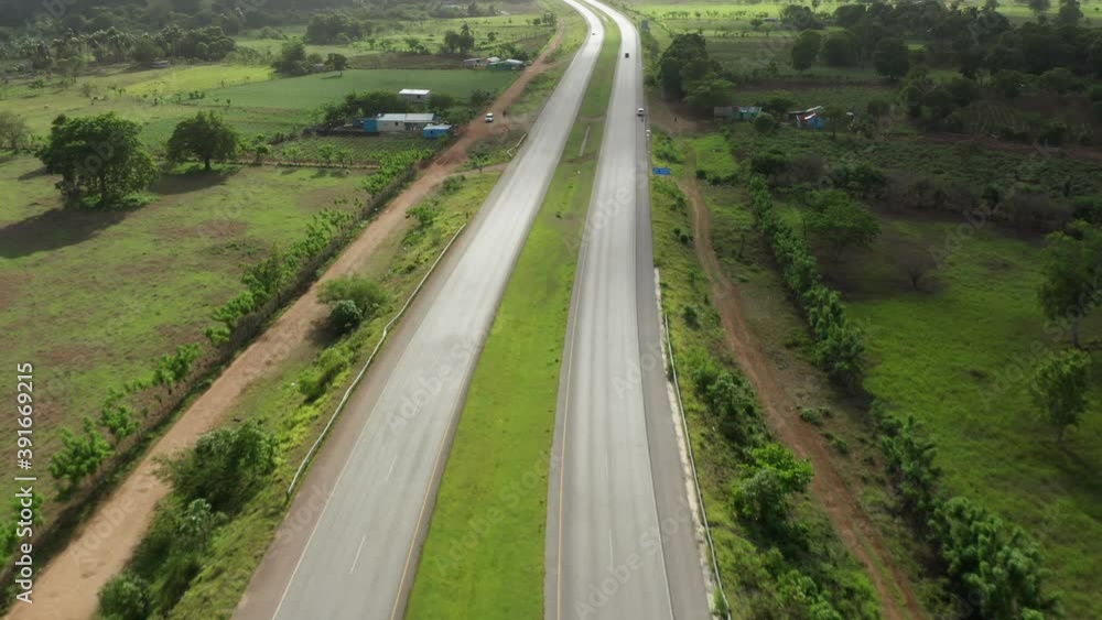 Farms along El Coral highway in Dominican Republic. Aerial forward Farms along El Coral highway in Dominican Republic. Aerial forward