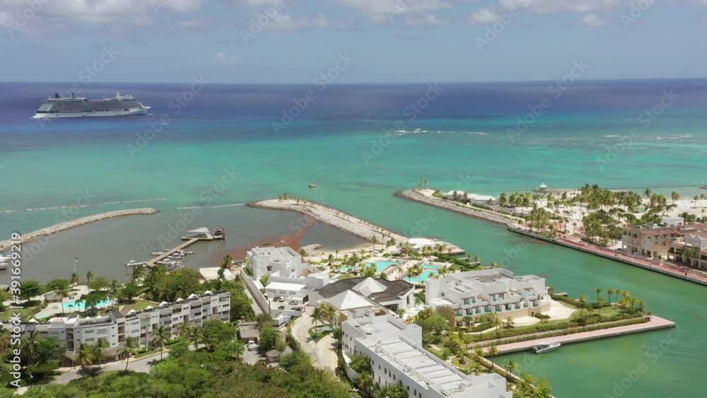 Cap Cana marina with cruise ship in background, Dominican Republic. Aerial Cap Cana marina with cruise ship in background, Dominican Republic. Aerial