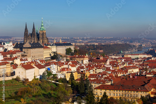 Autumn Prague City with gothic Castle and colorful Nature and Trees from the Hill Petrin, Czech Republic