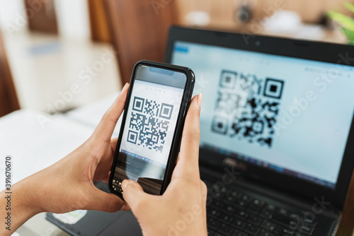 New form of payment of bills and bills in Brazil. Woman holding cell phone with pix app with QR-Code, x close-up of the screen.