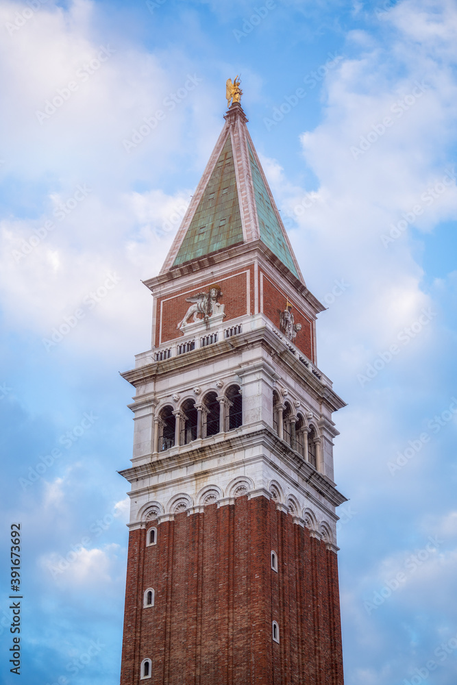 Details view of St Mark's Campanile tower against blue sky