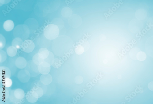 White lights bokeh, Defocus glitter blur on soft blue texture background. Bokeh christmas blurred beautiful shiny. 