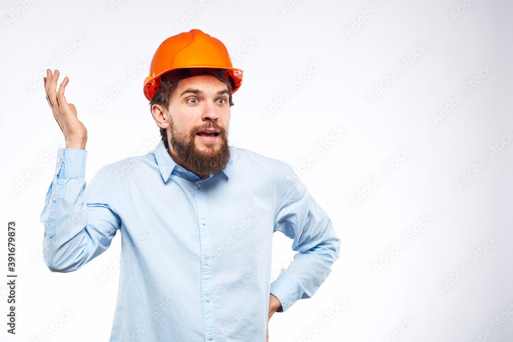 Cheerful male orange hard hat safety professional construction engineer Cheerful male orange hard hat safety professional construction engineer