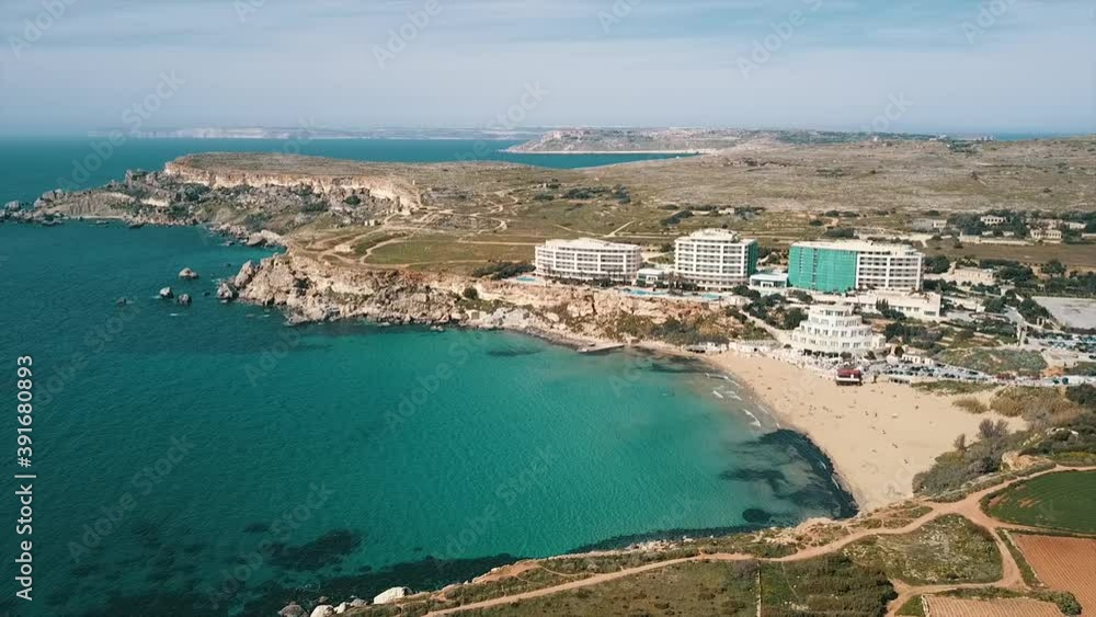 Bay and resort on the beach top view by drone in the sunny golden hour. Malta Island beach and resort. Bay and resort on the beach top view by drone in the sunny golden hour. Malta Island beach and resort.